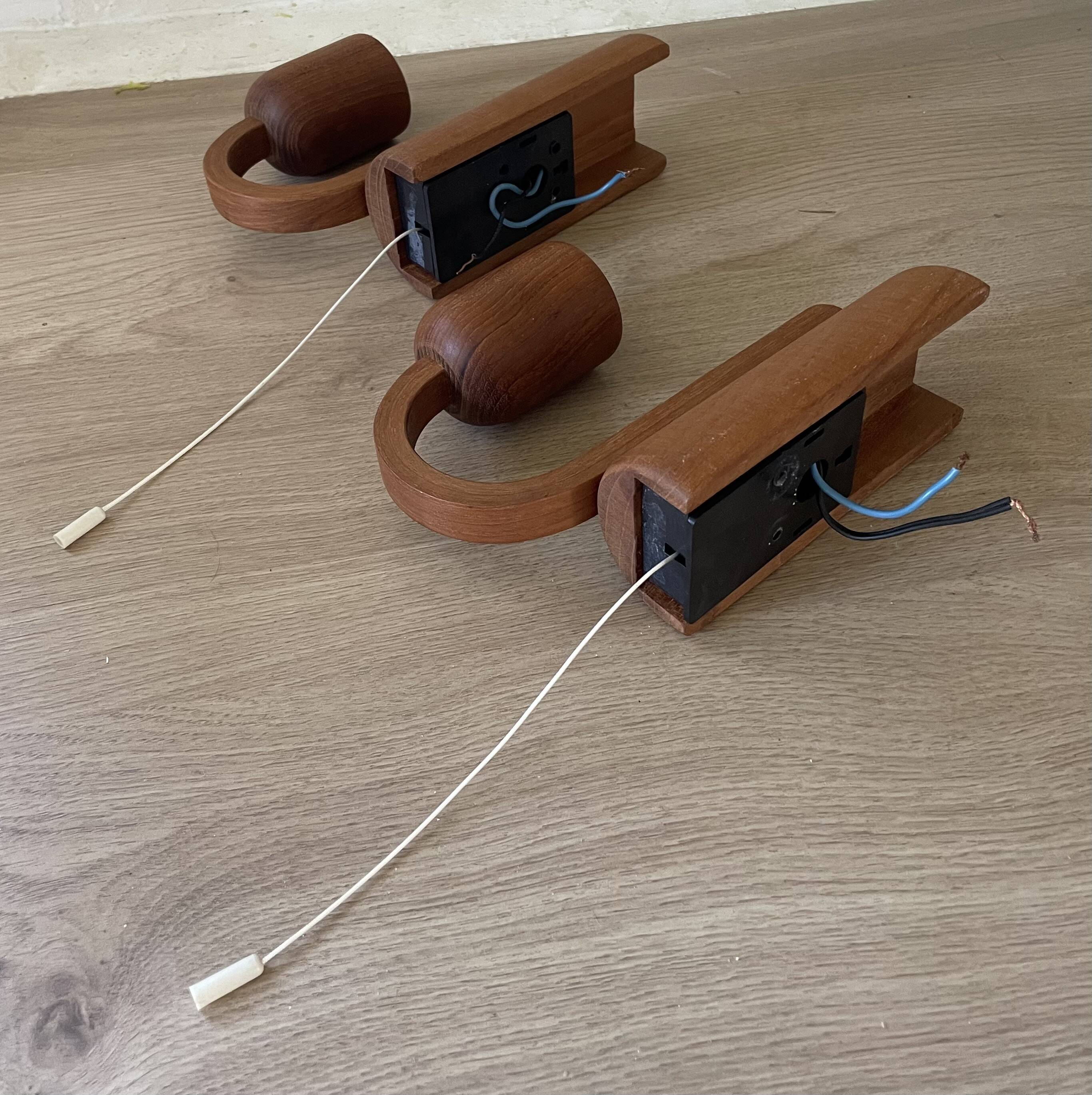 Pair of Scandinavian teak wall lights, Dolmus, 70s