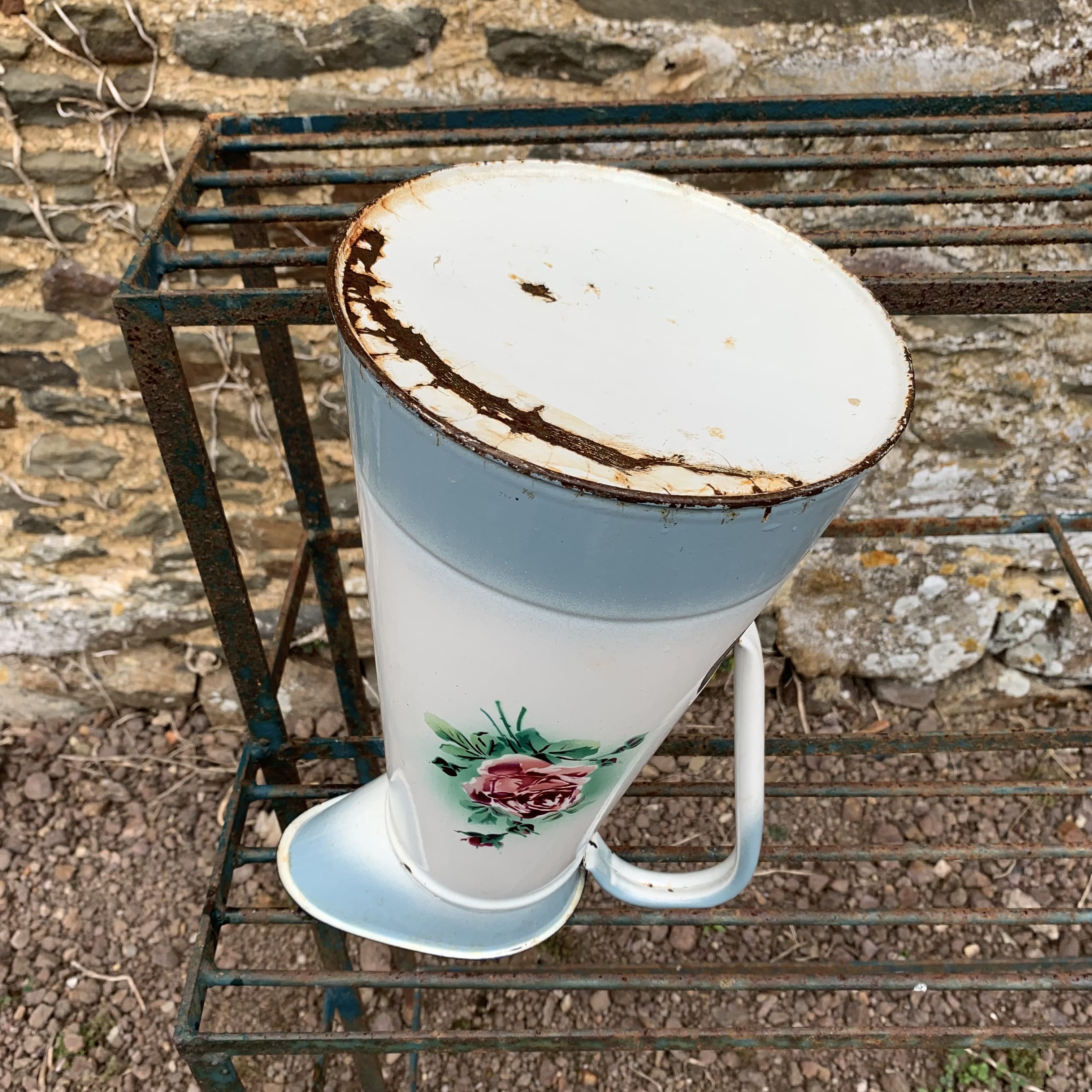 Enamelled broc with floral decoration