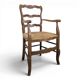 Wicker armchair in Louis XV style