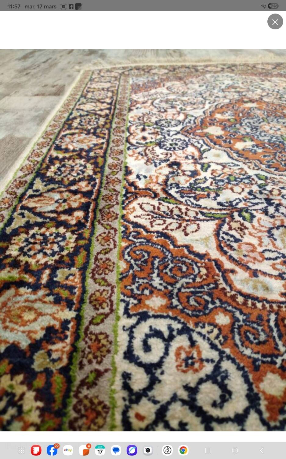 Handmade Persian carpet in wool and silk.