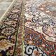Handmade Persian carpet in wool and silk.