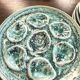 Set of 12 plates and an oyster dish or other in majolica.