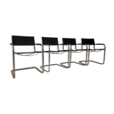 Four armchairs in chrome steel tube and black leather