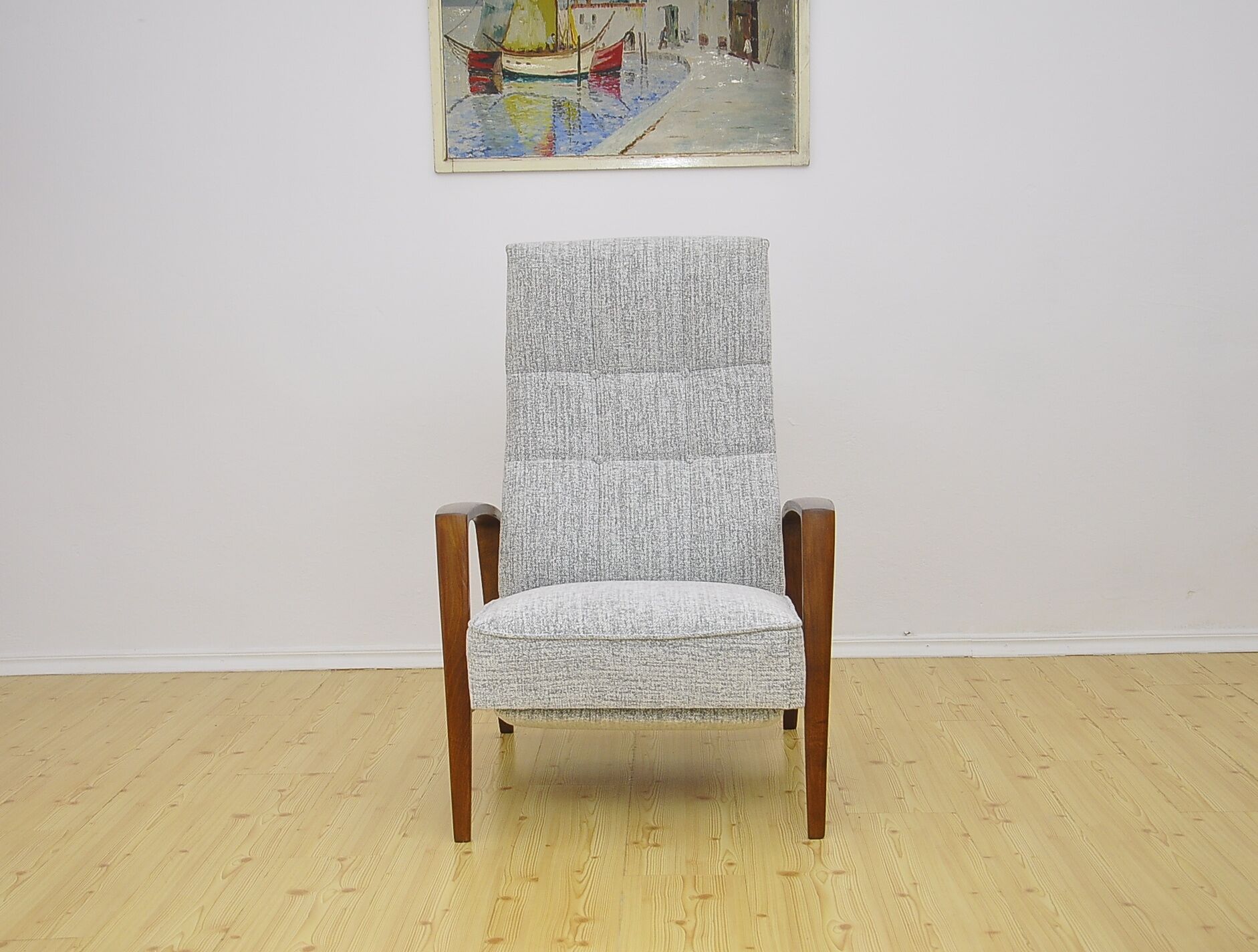 Mid-century armchair with folding footrest, 1960s