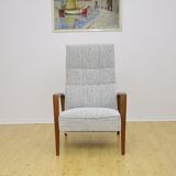 Mid-century armchair with folding footrest, 1960s
