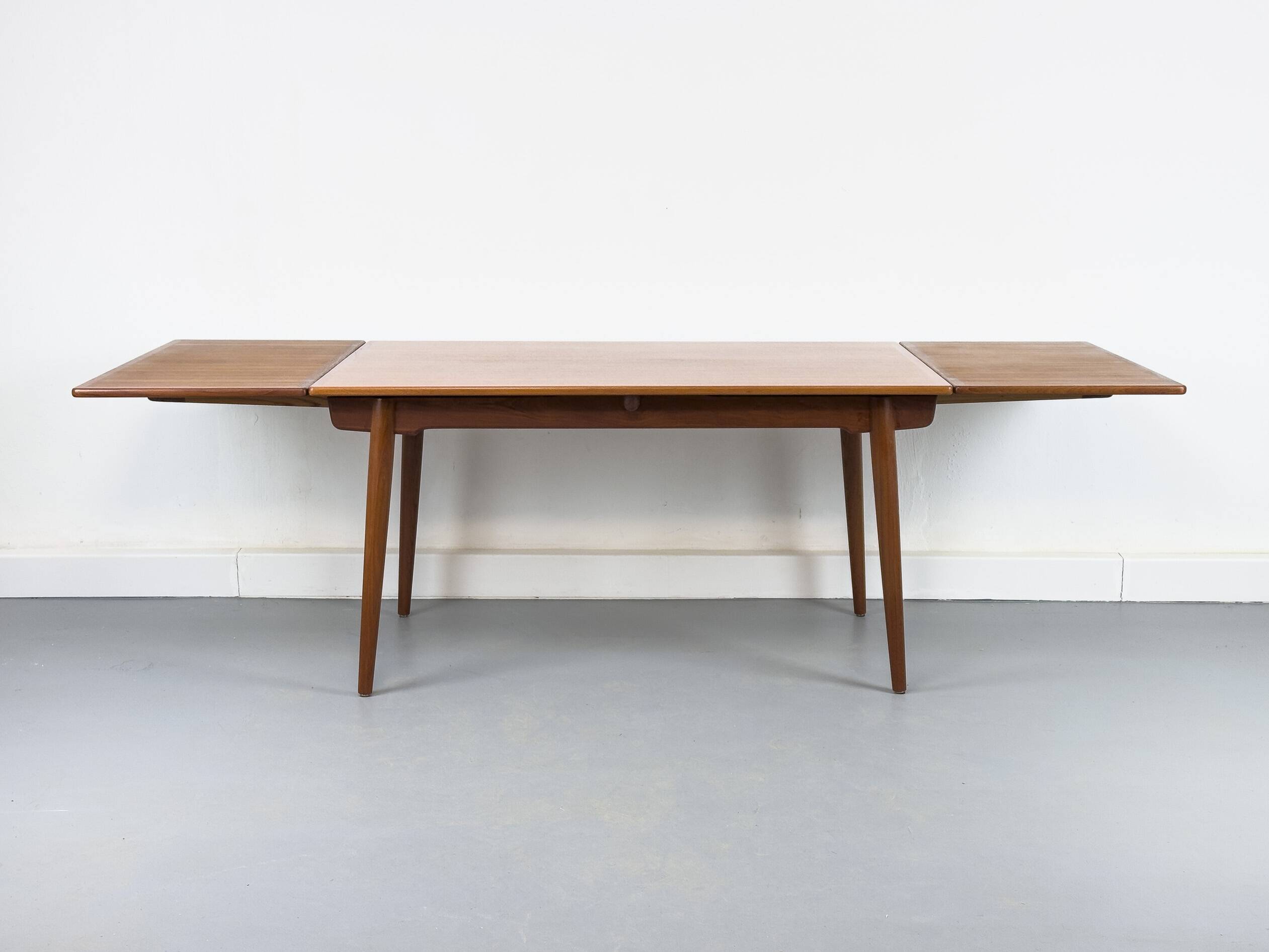 Table à manger en teck AT-312 par Hans J. Wegner pour Andreas Tuck, années 1960