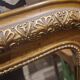 Antique Trumeau mirror in wood and gilding, in good condition.