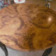 Round table art deco style - elm magnifying glass top and black wooden legs