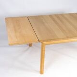 Coffee table of beech wood and with extension leaf of danish design by Rubby Furniture