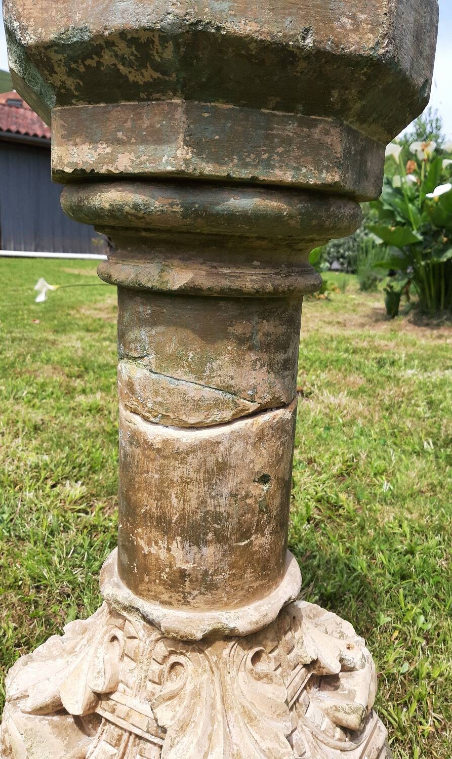 Holy water font on stone column (17th century)