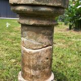 Holy water font on stone column (17th century)
