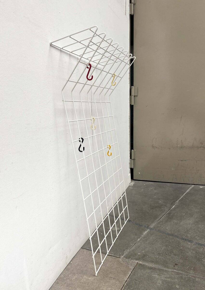 Minimalist white German mid-century coat rack with strings from the 1960s.