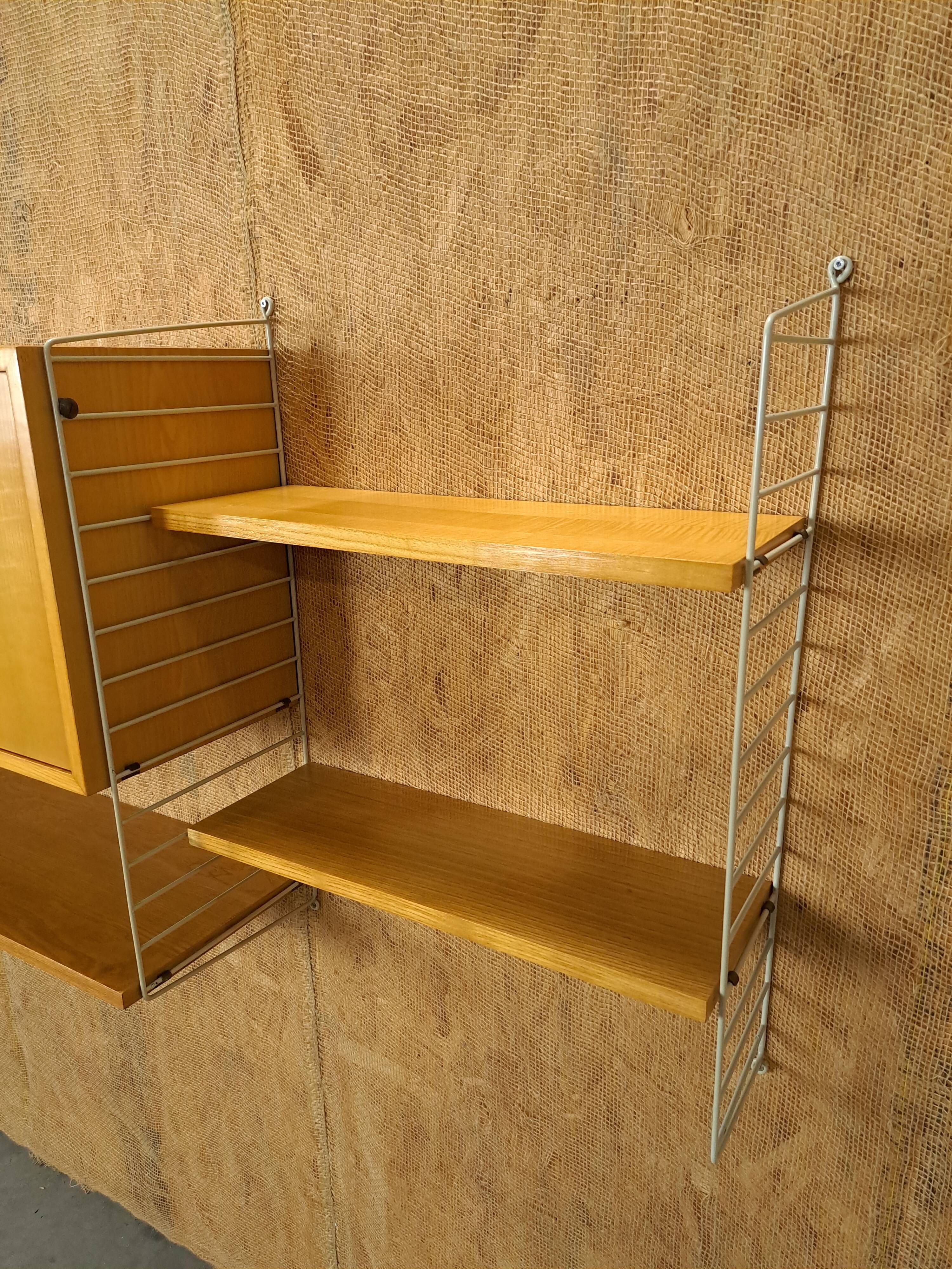 String modulair wandsysteem met kast en planken