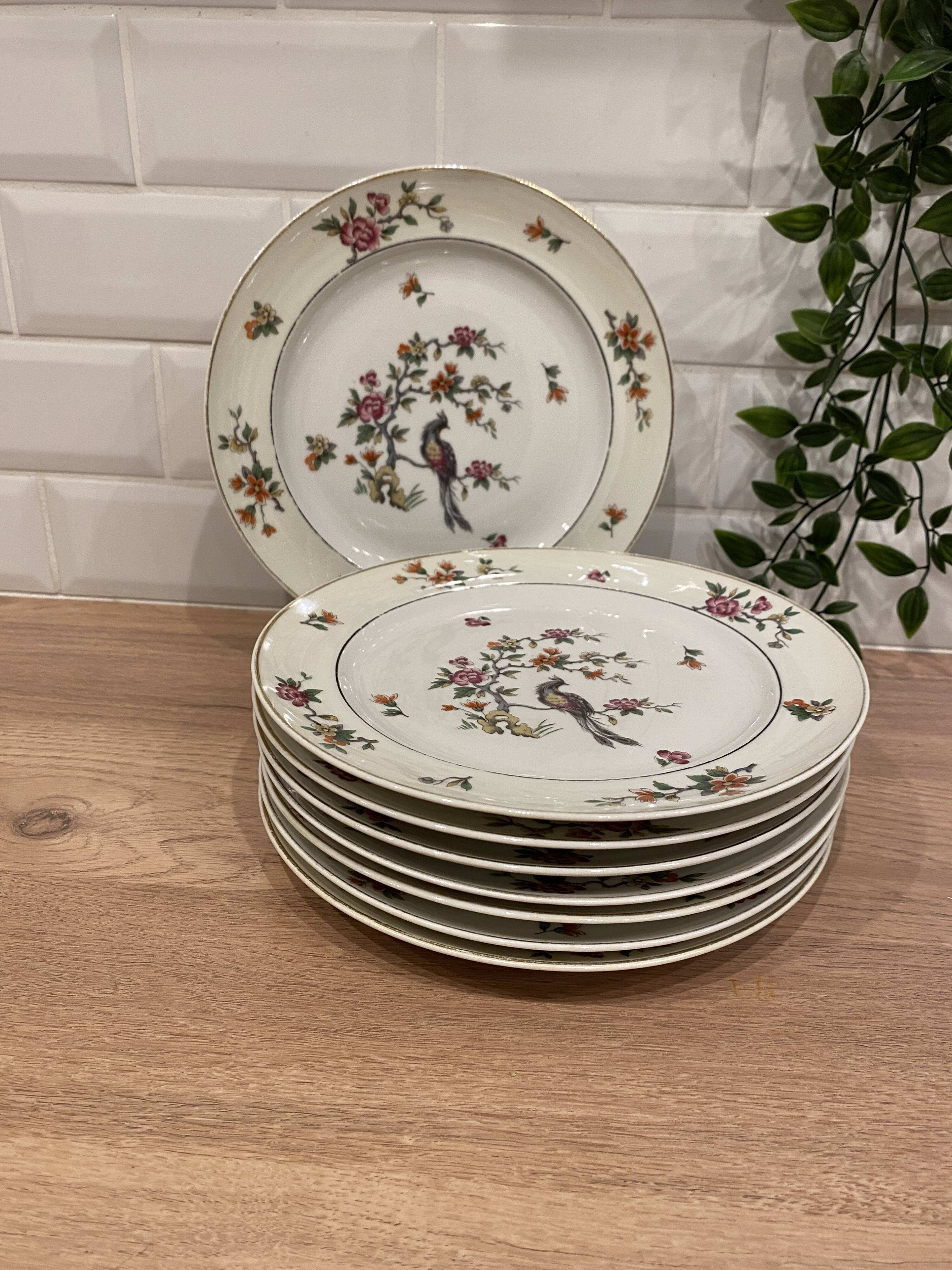 Set of 8 flat plates in Limoges porcelain