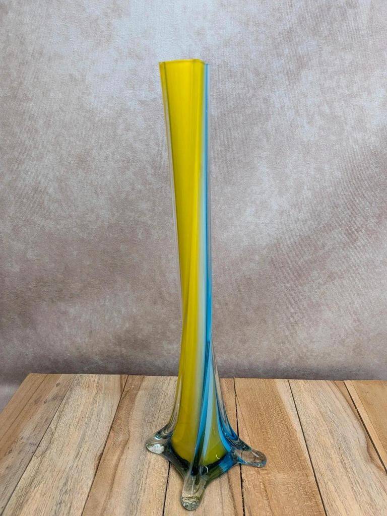 Vintage glass vase in blue and yellow Murano style.