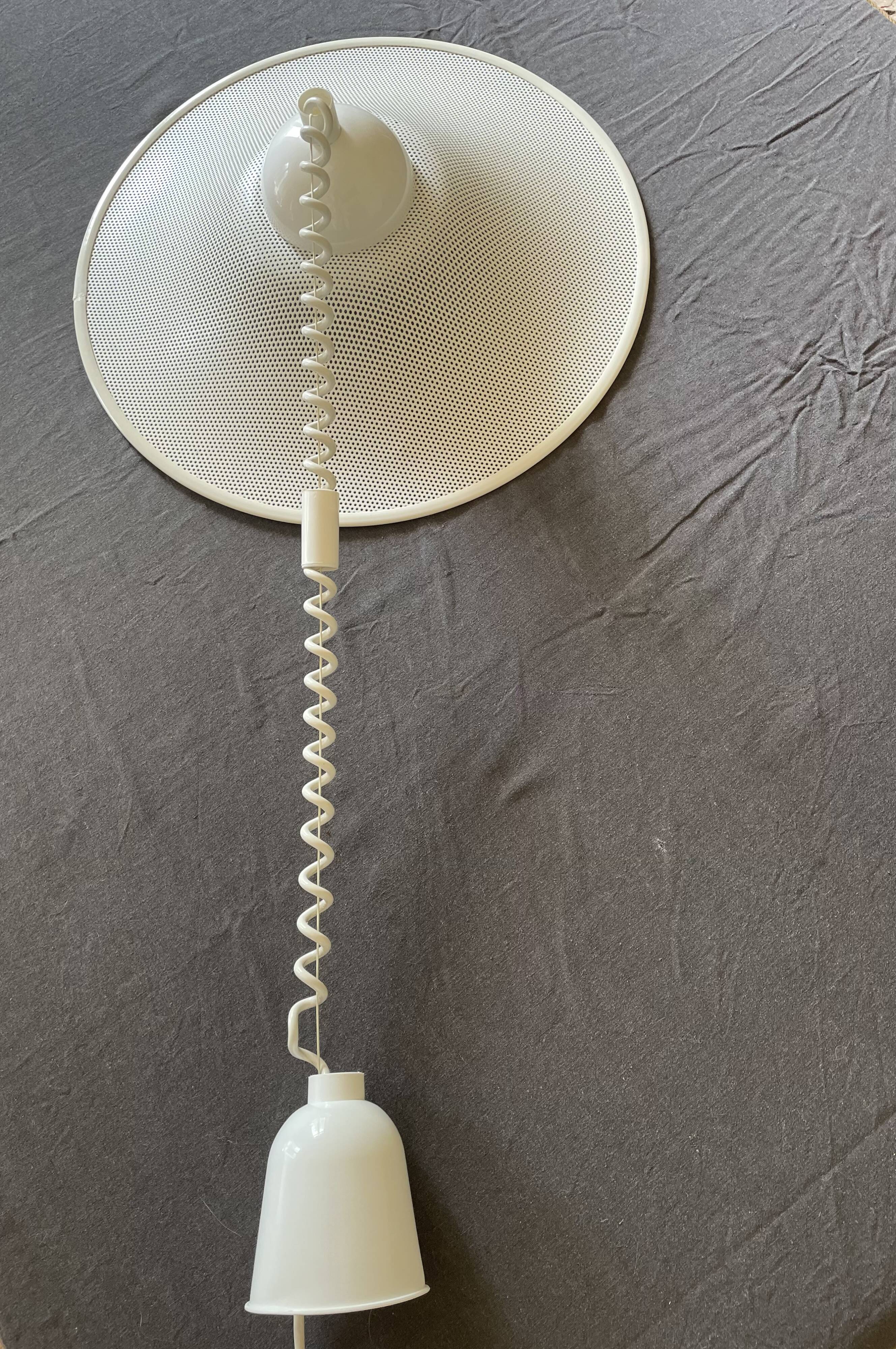 Suspension of the 80s in perforated white metal