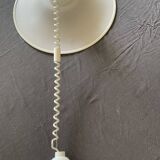 Suspension of the 80s in perforated white metal