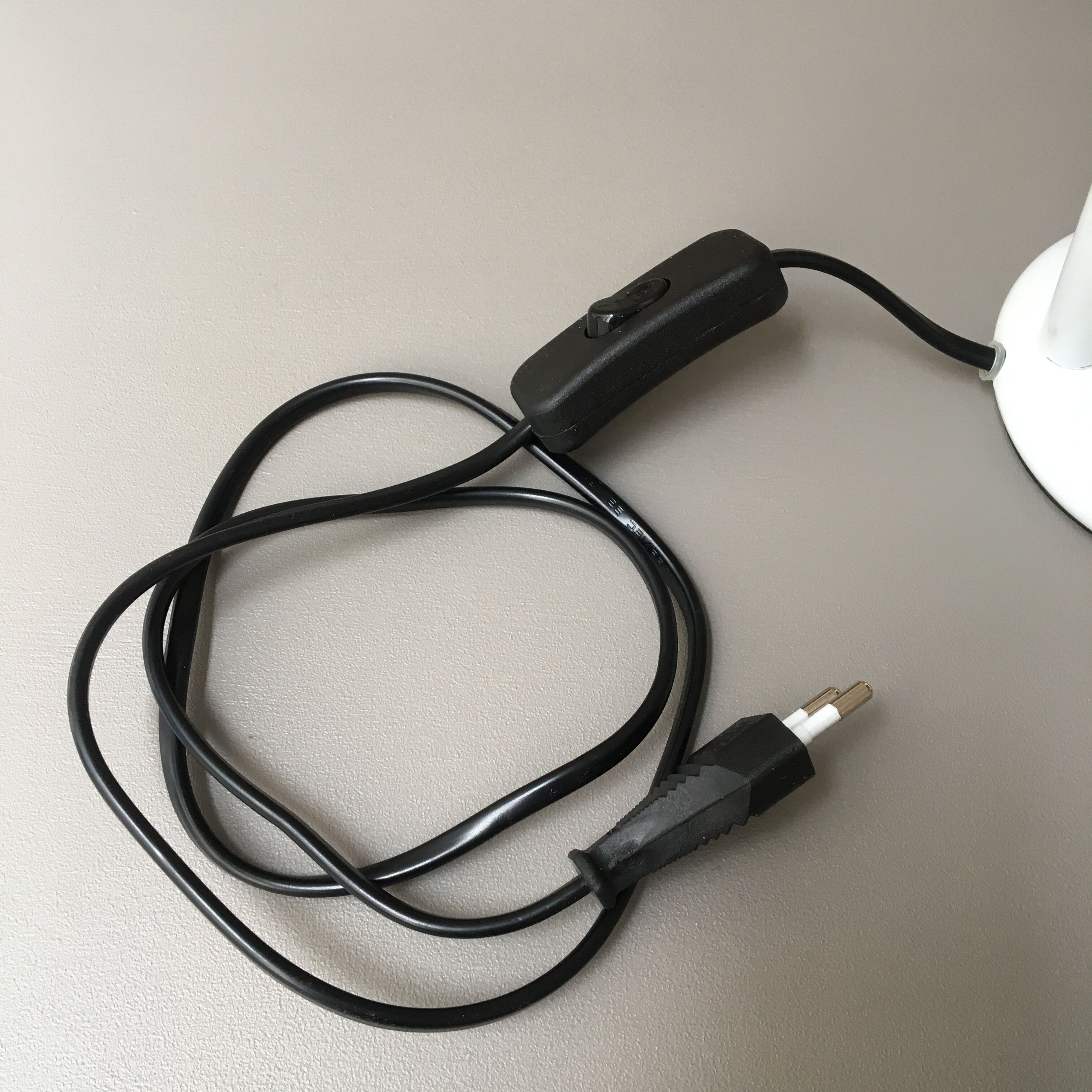 flexible white and stainless steel desk lamp