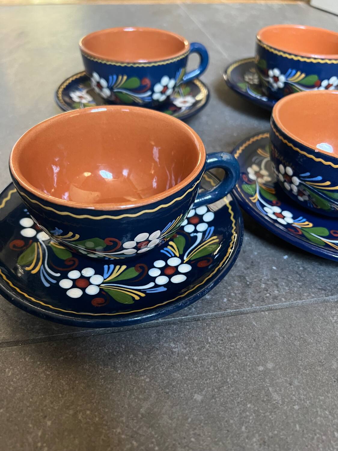 4 teacups and saucers