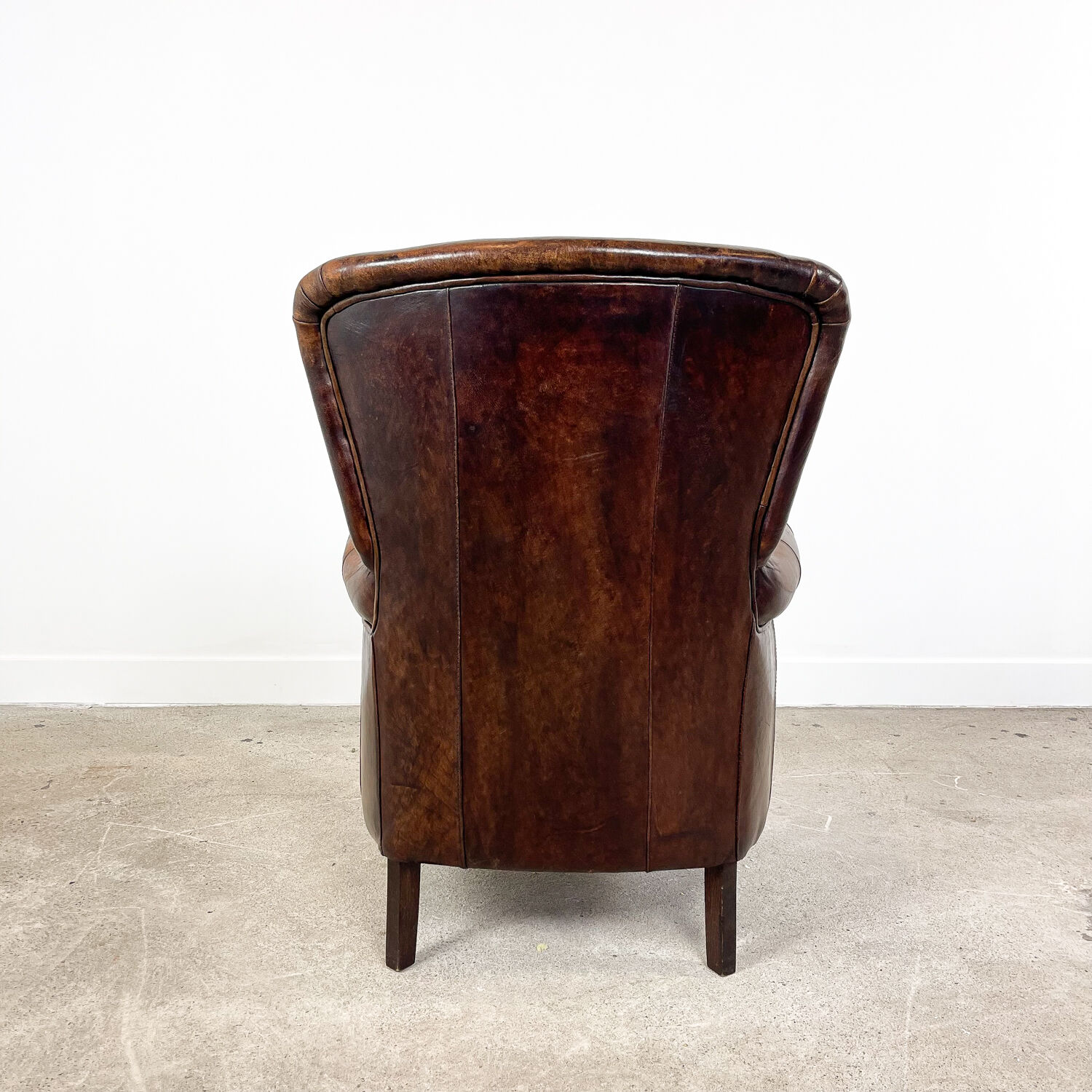 Vintage dark sheep leather club chair Achterdijk