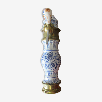 Vintage beer pump, made of earthenware, with brand "Heineken"