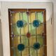 4 vintage faux stained glass panels that can form a screen or a partition