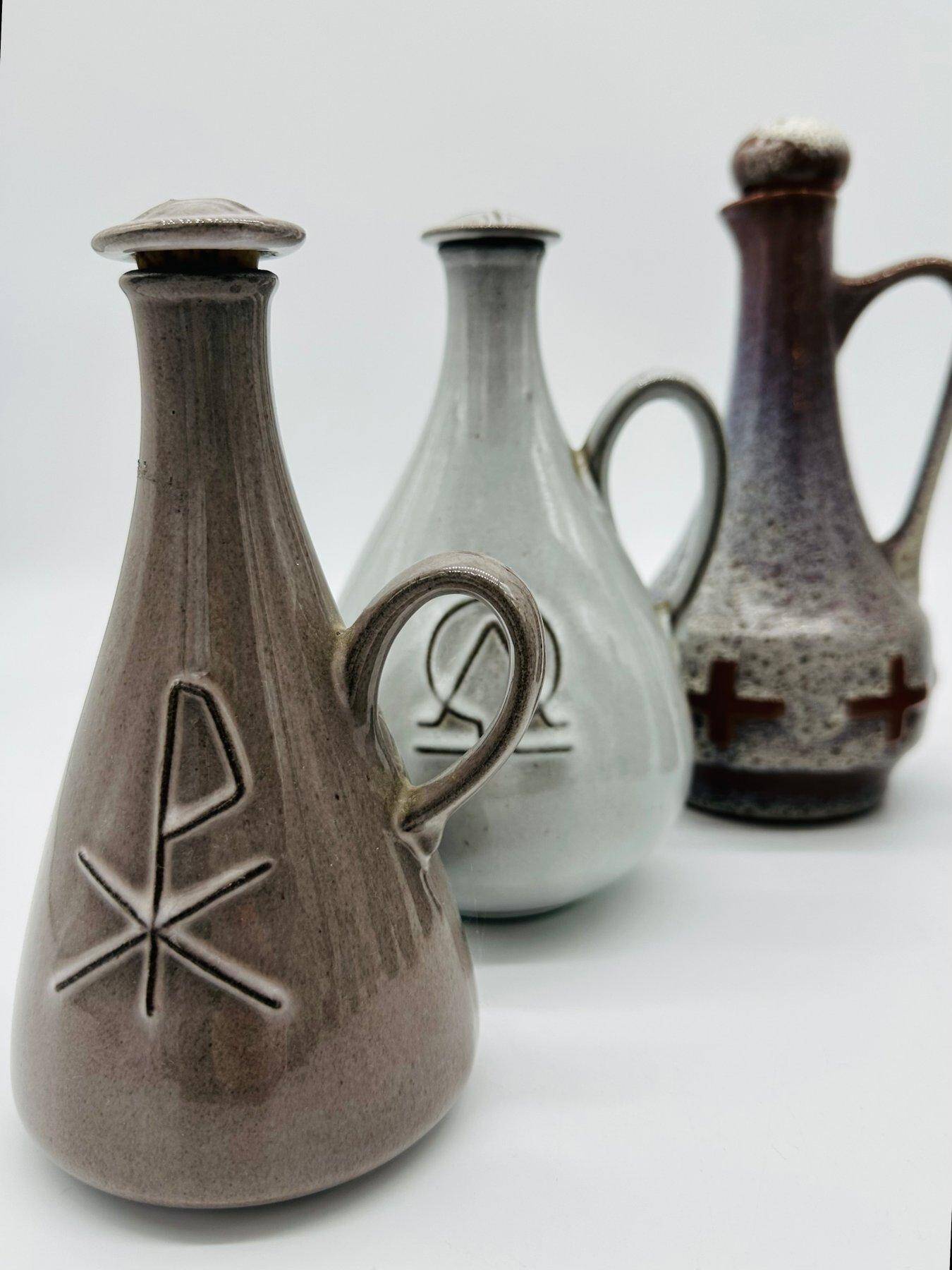 Set of nine modern sculptural ceramic vases from the mid-century, Bauhaus influence.