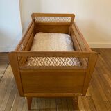 Wooden and wicker baby bed