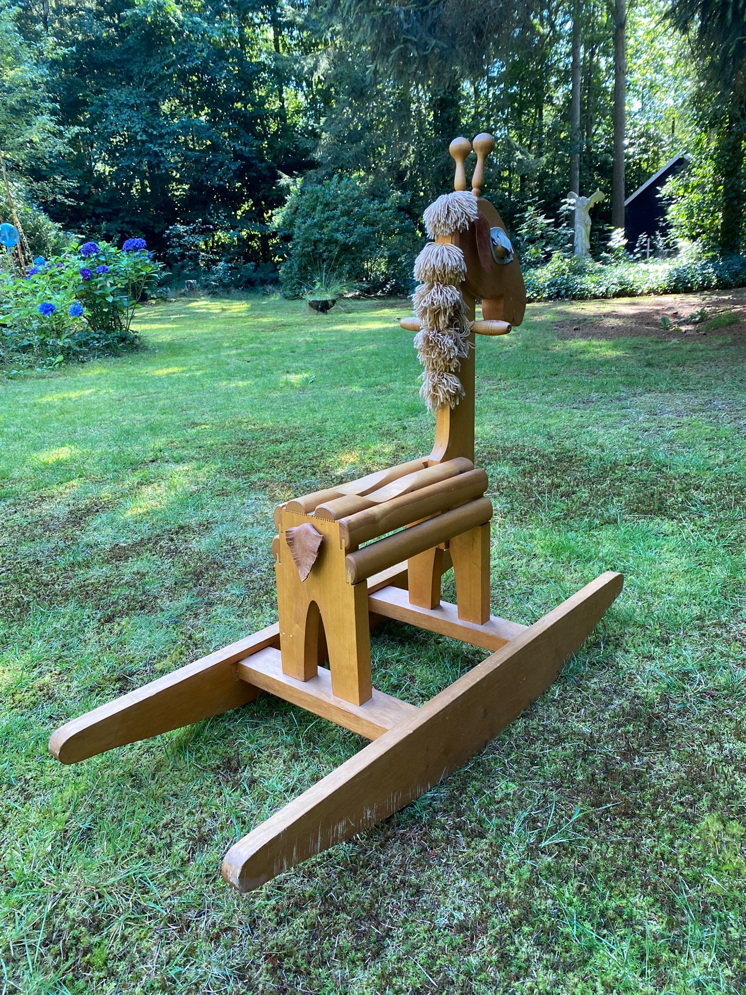 Vintage leather and pinewood rocking horse, giraffe, ca. 1970s