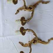 Old pairs of bronze wall sconces
