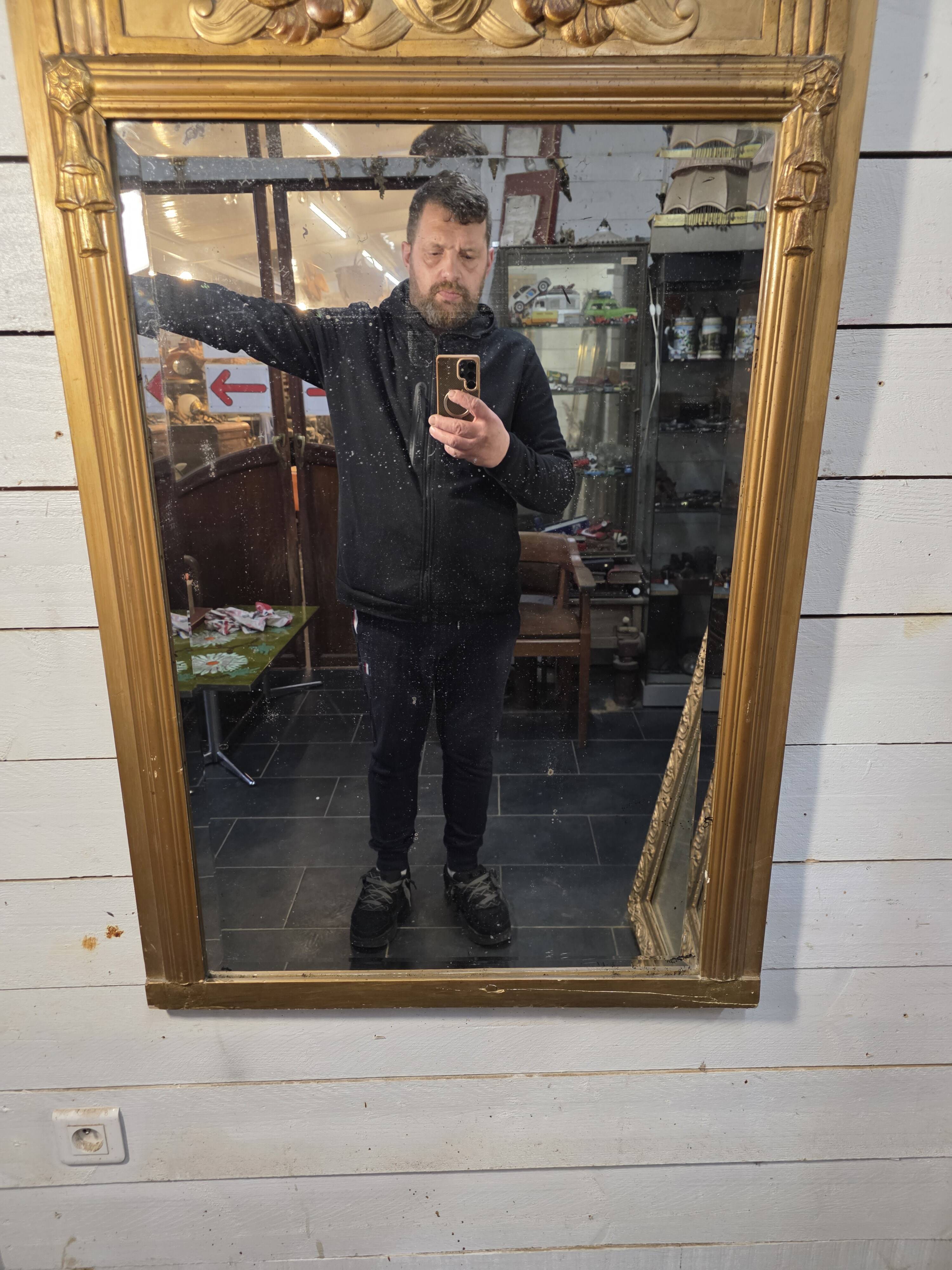 Art Deco gilded trumeau, bevelled mirror