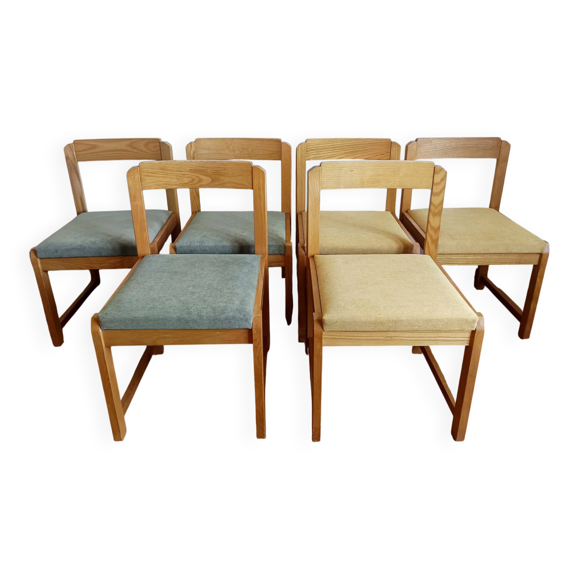 Six Scandinavian style chairs in elm and fabric.