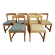 Six Scandinavian style chairs in elm and fabric.