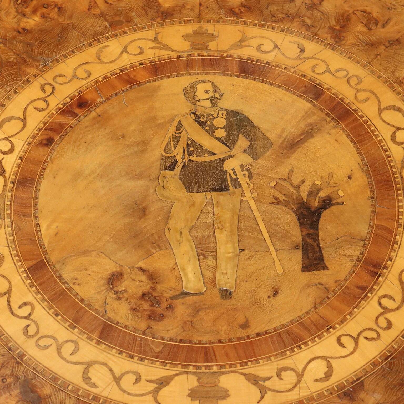 Round walnut table with marquetry of Vittorio Emanuele II
