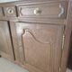 Two low antique buffets in carved solid oak with rosettes.