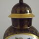 French Limoges Hergé table lamp base with gold highlights and floral decoration.