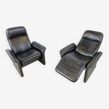Pair of black leather reclining armchairs, 1970s