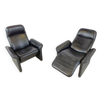 Pair of black leather reclining armchairs, 1970s