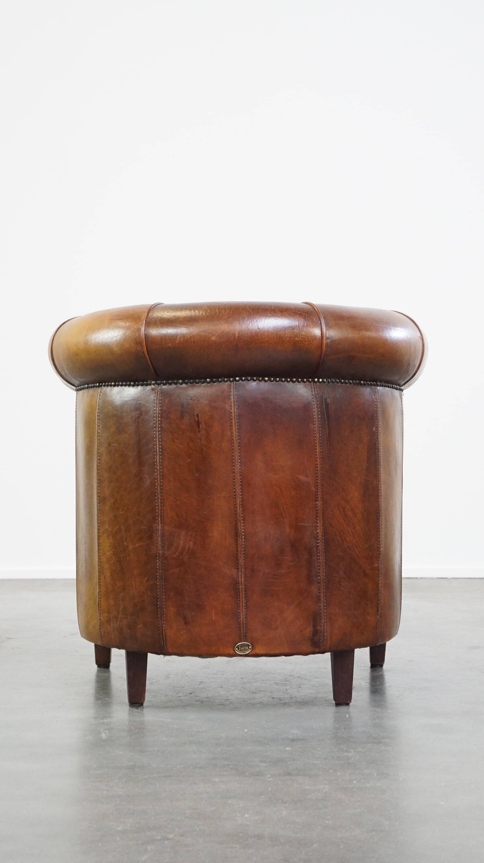 Brown leather club chair