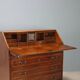 Antique drop-leaf cabinet in walnut with maple inlays, Italy, mid-18th century.