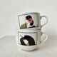 Set of 2 large Art Deco porcelain mugs by Roberto Tortoli.