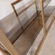 Brass shelf, smoked glass