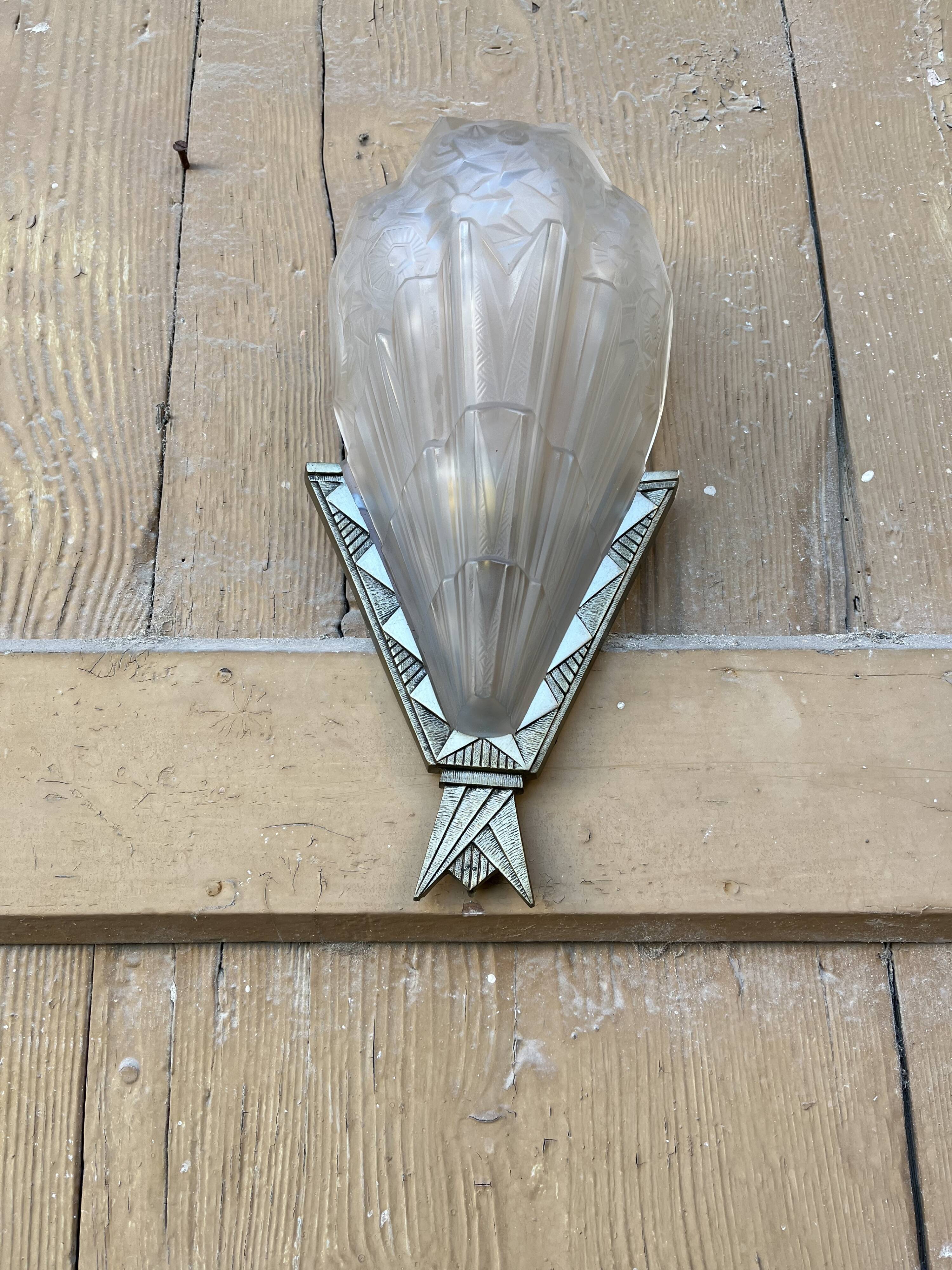 Signed art deco wall light