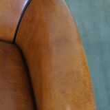 Fauteuil en cuir de mouton à l'aspect luxueux