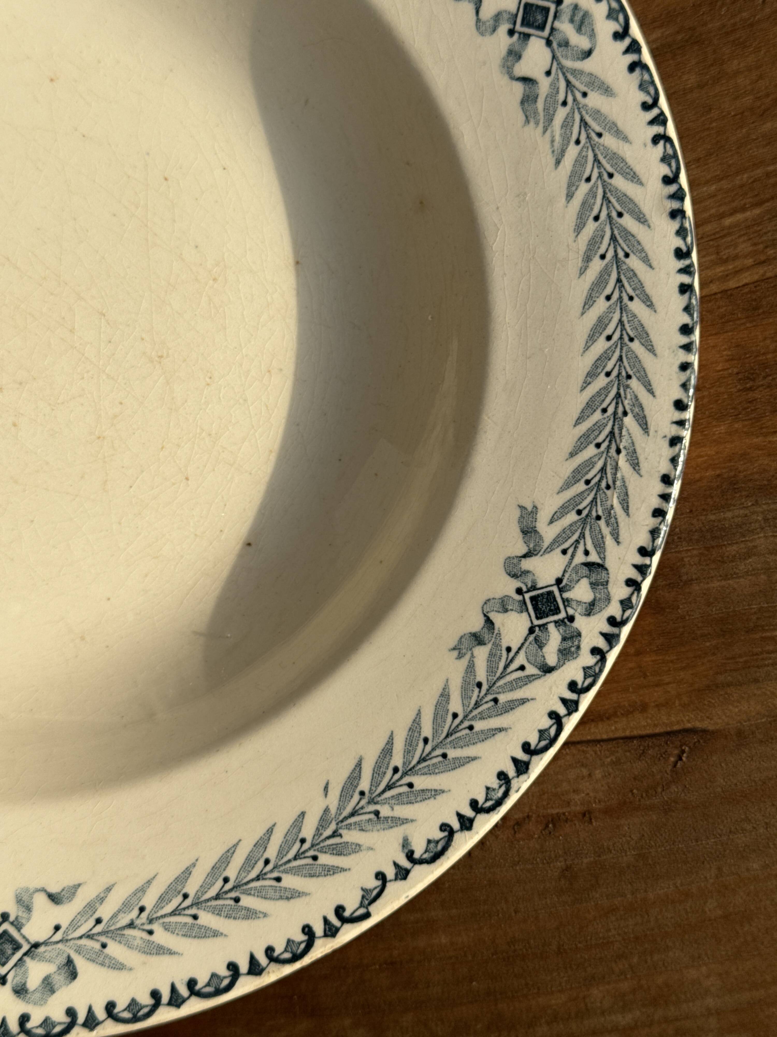 Set of 4 vintage deep plates in faience with blue decoration by Boulenger & Cie D2.