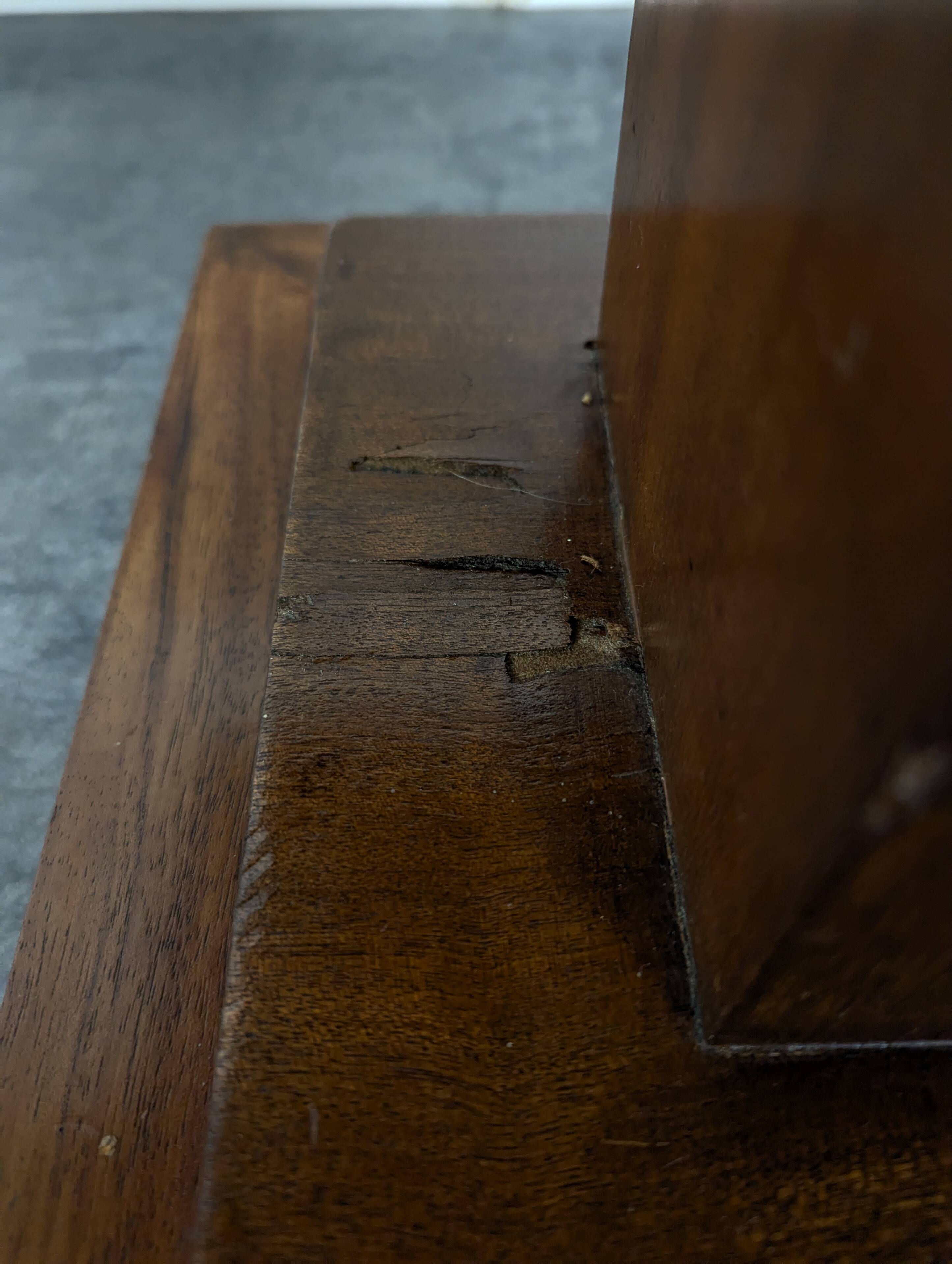 Modernist side table in mahogany veneer.