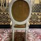 Suite de 4 chaises médaillons de style Louis XVI