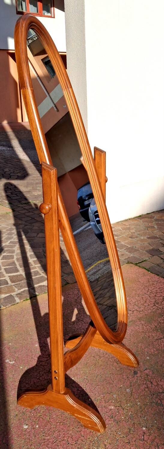 Adjustable full-length mirror for dressing room.