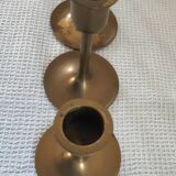 Set of 7 vintage brass candlesticks.