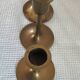 Set of 7 vintage brass candlesticks.